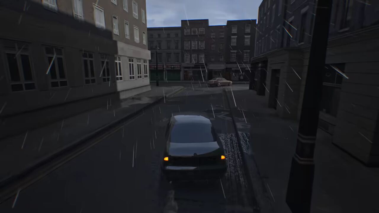 A black saloon with its indicators on, driving down a rainy London street.
